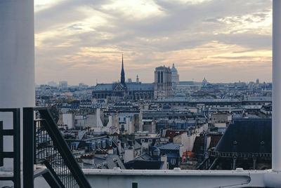 Cityscape against sky during sunset