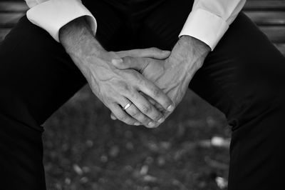 Close-up of hands against blurred background