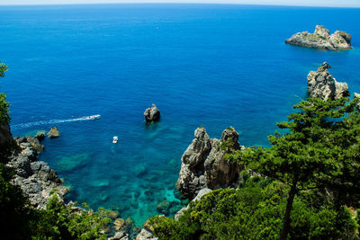 High angle view of sea against blue sky