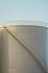 Low angle view of staircase against clear sky