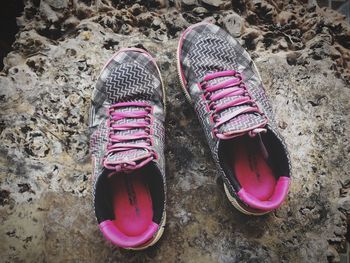 High angle view of shoes on sand