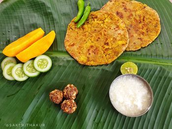 High angle view of food on leaves