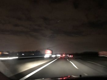 Cars on highway at night