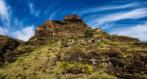 Scenic view of rock formation against sky