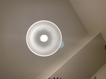 Low angle view of illuminated pendant light