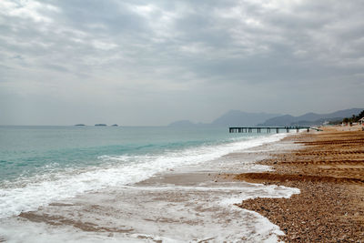 Scenic view of beach against sky