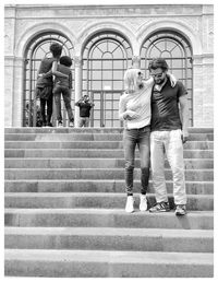 People standing on staircase of building