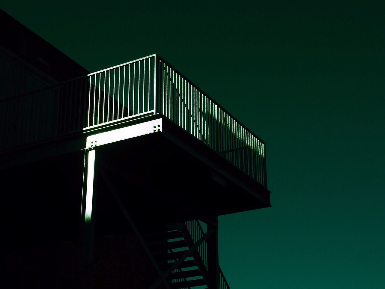 railing, no people, shadow, low angle view, built structure, architecture, indoors, illuminated, staircase, day