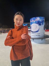 Portrait of smiling girl standing during winter