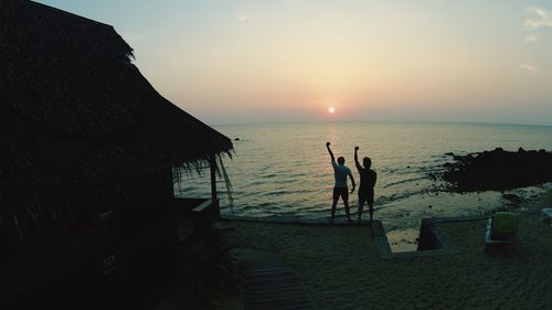 Scenic view of sea at sunset