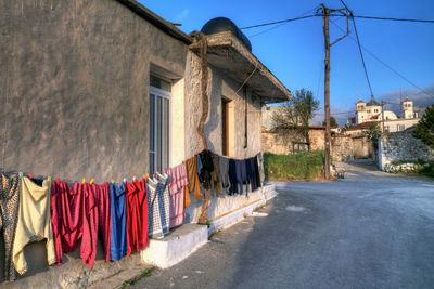 Clothes drying outside house