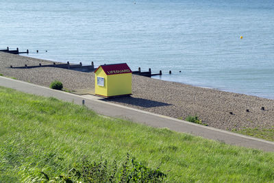 High angle view of beach hut against sea