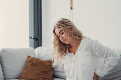 Portrait of smiling woman looking away