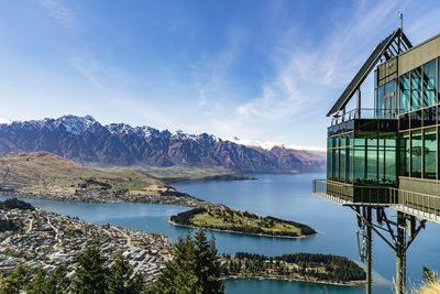 Panoramic view of sea and mountains against sky