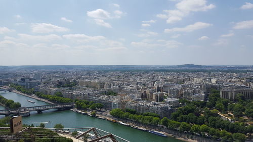 Aerial view of river and cityscape 