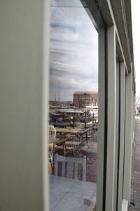 Buildings seen through glass window