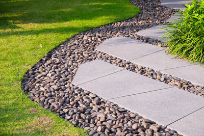 High angle view of stone wall in garden