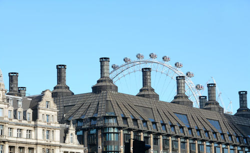 Low angle view of building against blue sky