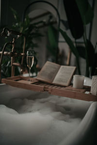 Luxury interior of big bathroom at modern african style with oval bathtub in natural lighting