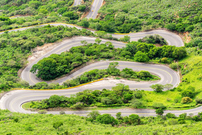 High angle view of winding road on landscape