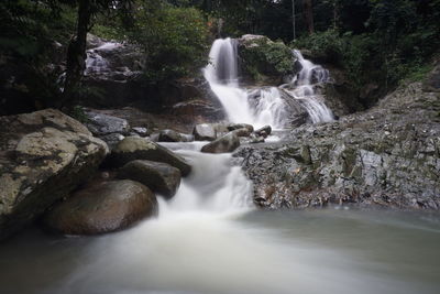 View of waterfall in forest