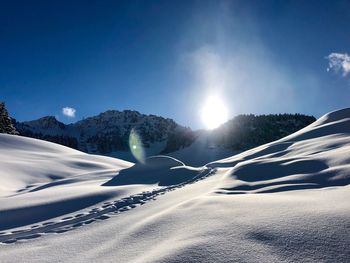 Snow covered mountain against sky