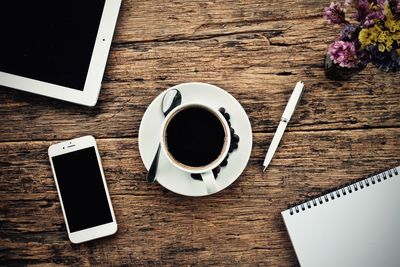 High angle view of coffee cup on table