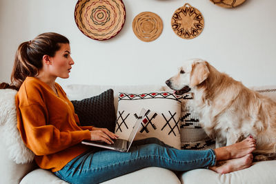 Woman with dog at home