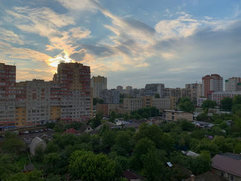 High angle view of buildings against sky during sunset