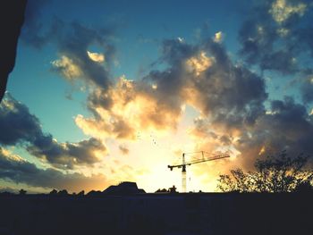 Dramatic sky over town during sunset