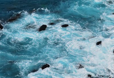 High angle view of waves in sea