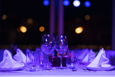 Empty wineglasses on table in restaurant