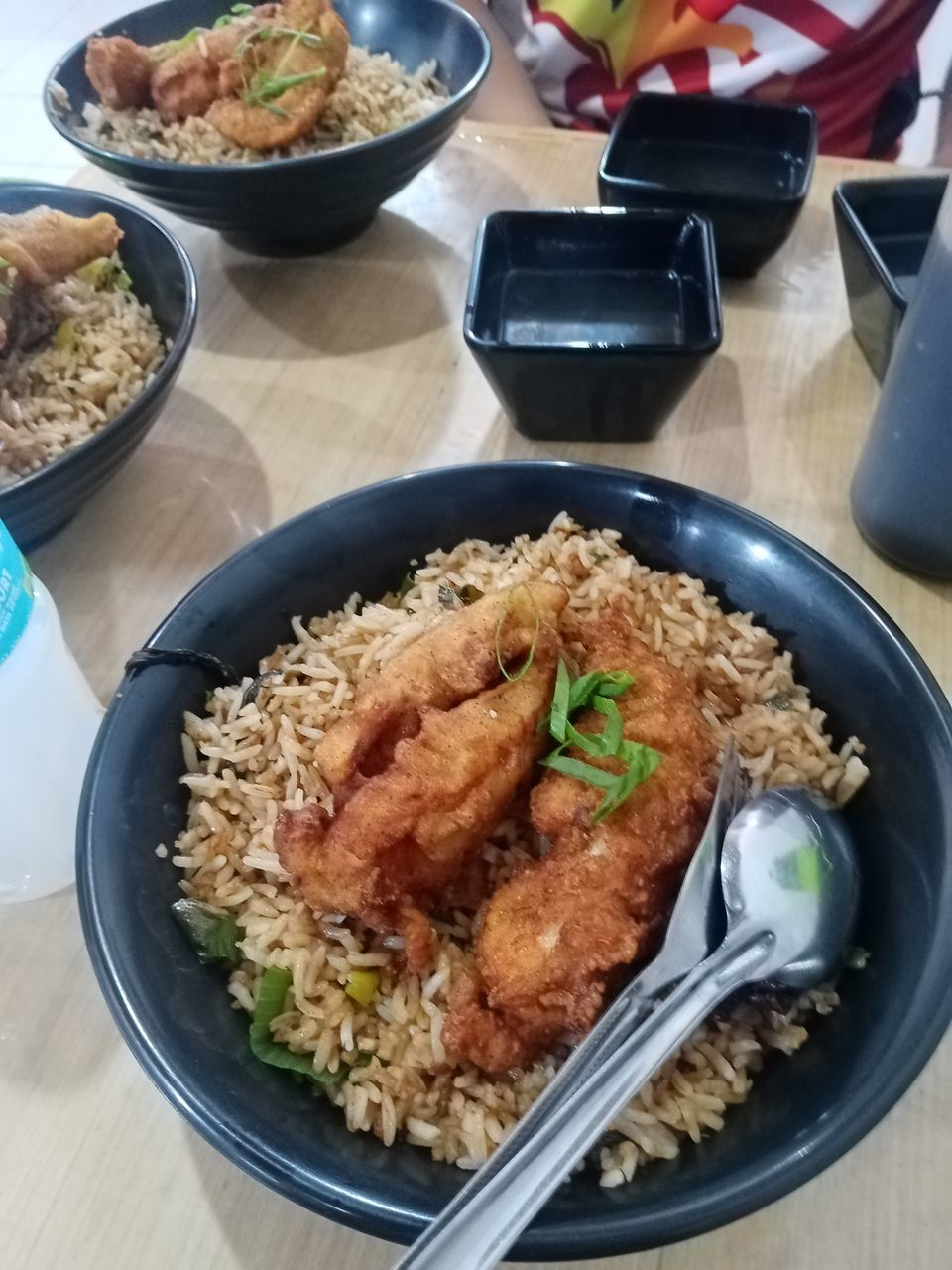 food and drink, food, table, lunch, healthy eating, freshness, plate, dish, meat, high angle view, wellbeing, meal, indoors, cuisine, asian food, no people, rice - food staple, bowl, vegetable, chinese food, serving size, kitchen utensil, eating utensil, still life, pasta, fried rice, seafood, fried