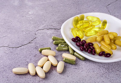 High angle view of fruits in plate on table