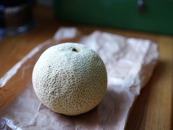 Close-up of cantaloupe melon on table