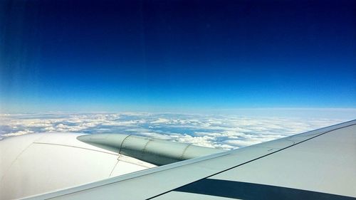 Cropped image of airplane wing