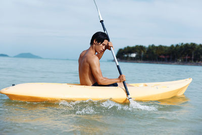 Man surfing in sea