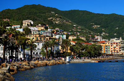 Scenic view of cinque terre by sea