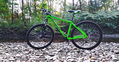 Bicycle parked on field