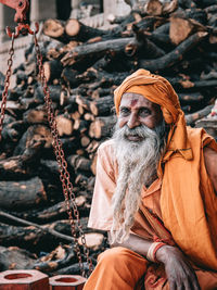 Portrait of man sitting outdoors