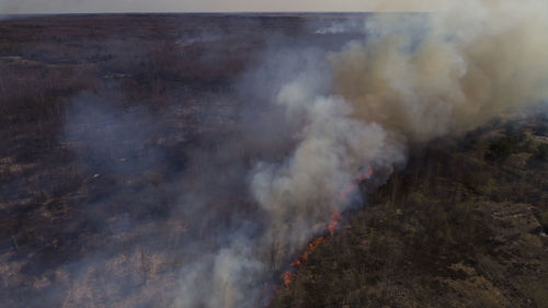 Smoke emitting from volcanic mountain