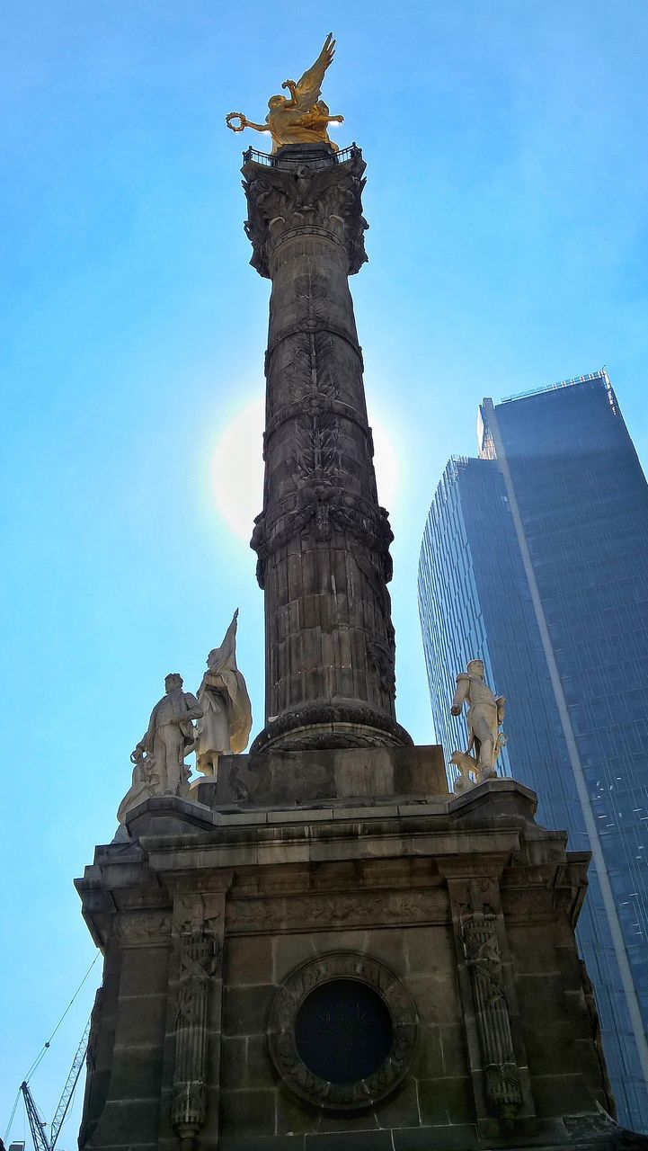 architecture, built structure, low angle view, building exterior, sky, statue, sculpture, travel destinations, art and craft, representation, human representation, the past, nature, history, travel, tourism, no people, building, day, belief, outdoors, architectural column