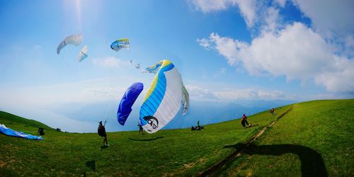 Panoramic view of kites flying in sky