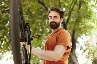 Young man exercising in park