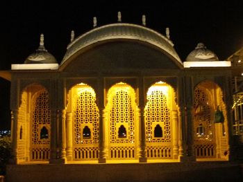 Illuminated historic building against sky at night