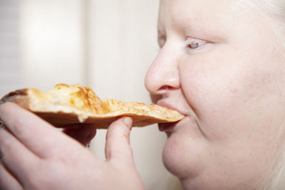 Close-up of boy eating food