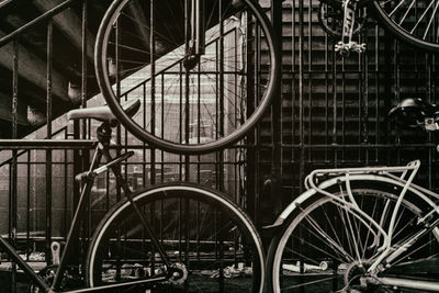 Bicycle parked by railing in city