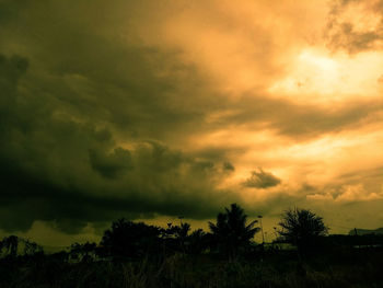 Scenic view of dramatic sky during sunset