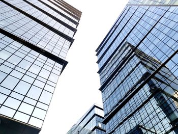 Low angle view of modern buildings against clear sky