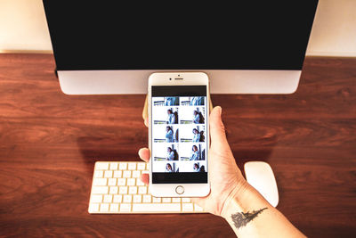 Low section of person using smart phone